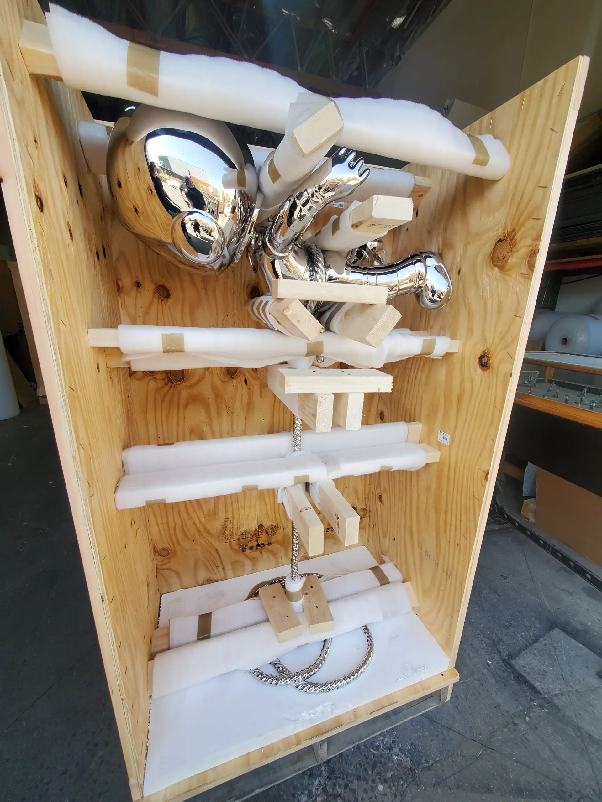 Silver decorative fixtures carefully padded and crated